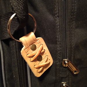 A small key fob with weaving